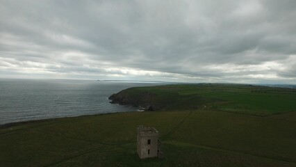 Scenic view of sea and hill