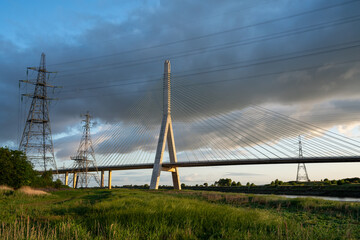 Fototapeta premium view of the Flintshire Bridge, also known as the Second Dee Crossing, at sunrise