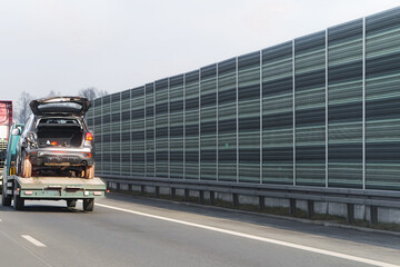 Vehicle loaded on roadside recovery truck