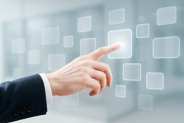 Business hand touching glowing digital interface button on transparent futuristic screen with tech icons on light blue blurred background.