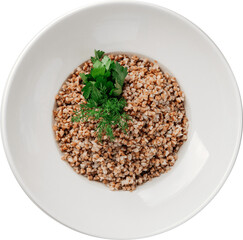 Healthy buckwheat porridge with fresh herbs served in a white bowl, top view.