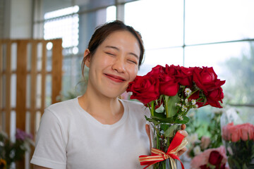 Young entrepreneurs are working at florist shop.