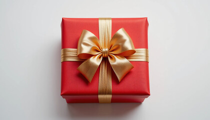 Red gift box with gold bow, top view, on clean white background.
IA generativa.