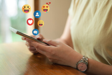 Social Distancing ,Working From Home concept..The concept of living on vacation and playing social media. Social media and digital online concept, man using smart phone with Social media.