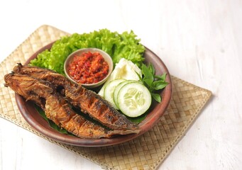 Pecel lele or pecek lele or penyetan is a typical East Javanese food, consisting of catfish and tomato sauce. Usually, pecel lele is catfish that is fried dry in oil, then served with tomato sauce and