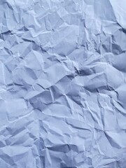 Wrinkled Paper Texture: A close-up shot of a crumpled paper, revealing a intricate textures and creases, it tells a story of wear and tear.