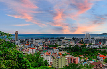 view of Patong and Patong Beach from the mountains colourful skies at Sunset. Patong is a vibrant city full of tourists from all around the world. 
