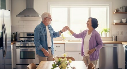 Happy Senior Couple Dancing Together in Modern Kitchen at Home