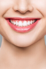 A CloseUp Image Featuring a Beautiful, Smiling Face Showcasing Perfectly White Teeth
