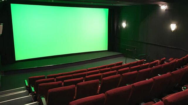 Movie theater screen filled with green screen color (#00FF00), seats in foreground under low ambient lighting, 4K, isolated on white background