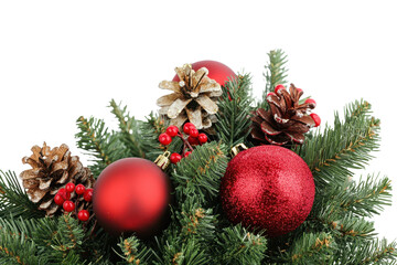 Beautiful Christmas decoration featuring a festive arrangement of pine branches, red ornaments, and pine cones ready for holiday celebrations