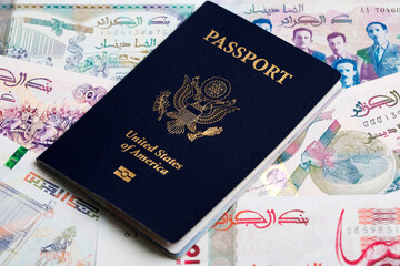 American passport on Algerian dinar