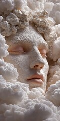 Close up of a textured sculptural face emerging from white fluffy clouds