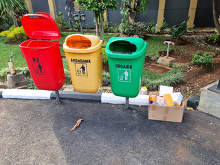 Littering Next to Trash Bins, Poor Waste Management Behavior in Public Area