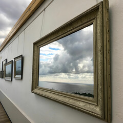 empty picture frame holding sky