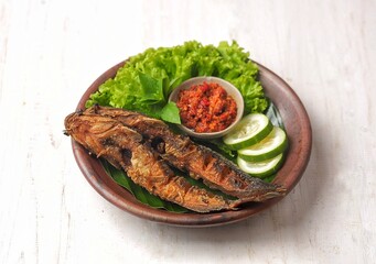 Pecel lele or pecek lele or penyetan is a typical East Javanese food, consisting of catfish and tomato sauce. Usually, pecel lele is catfish that is fried dry in oil, then served with tomato sauce and