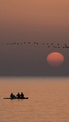 sunrise on a paddle board