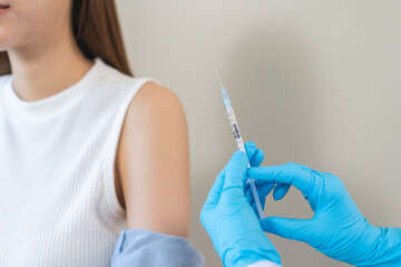 Health care, corona virus, hand of woman nurse, doctor giving syringe vaccine, injection dose on...