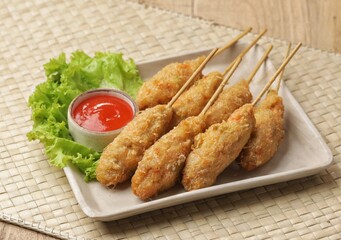 Sempol Ayam is a type of fried food made from tapioca flour.