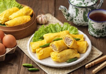 Sosis Solo Basah. Wet solo sausage is a snack containing chopped chicken wrapped in an omelet and then rolled up. This wet solo sausage is cooked by steaming