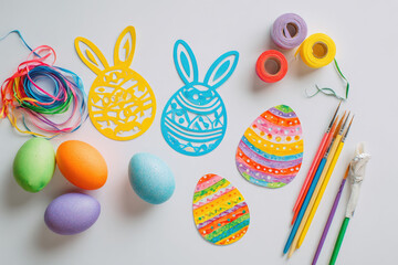 Creative easter egg decorating activity home workshop craft project indoor space top-down view family bonding fun