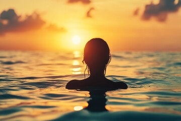 Serene sunset swim, lone woman in silhouette against glowing sky, vintage camera effect