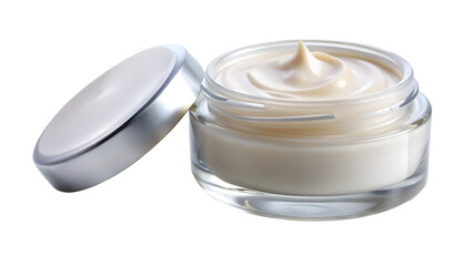 A glass jar of creamy white cosmetic cream with a silver lid, isolated on transparent background