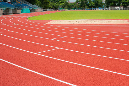 Red running track Synthetic rubber on the athletic stadium