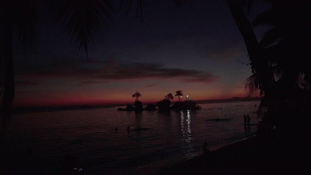 Willy Rock is a tidal island with a statue of the Virgin Mary at the Boracay beach in Philippines