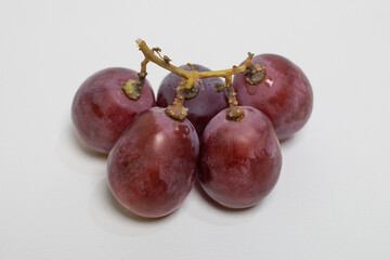 Close-up of sweet purple grapes with natural shine.