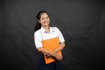 In a world becoming more connected, the Asian high school girl sees education as the bridge to...