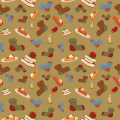 Seamless vector pattern of cozy autumn elements: socks, pumpkin pie, apples, books, and candles on an olive green background. Ideal for fall home decor, seasonal fabric.