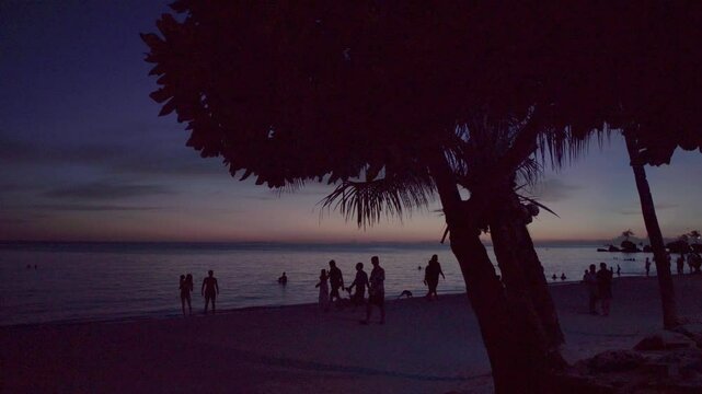 Willy Rock is a tidal island with a statue of the Virgin Mary at the Boracay beach in Philippines