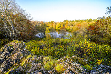 View of the Windsborn Kratersee and the surrounding landscape. Nature at the lake in the Eifel...