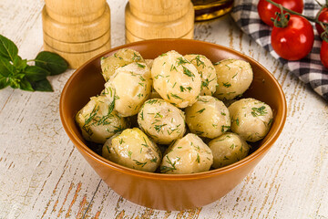 Young boiled mini potato with dill