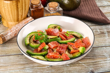 Salad with avocado and salmon