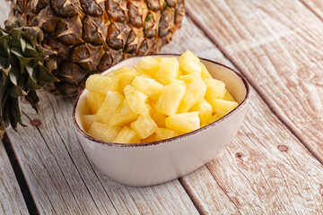 Sweet canned pineapple fruit pieces