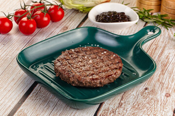 Grilled juicy beef cutlet for burger