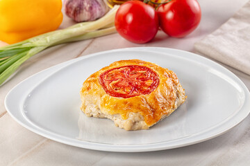 Chicken chop cutlet with cheese and tomato