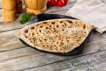 Turkish Kutab staffed green herbs