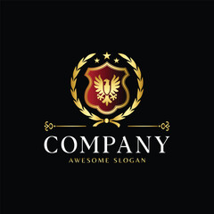 Luxury Royal Crest Logo with Golden Eagle in Shield and Laurel Wreath on Black Background