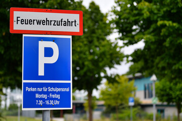 Sign in German Fire lane and parking lot for school staff only