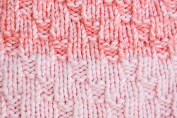 pearl-colored pattern with pink knitted fabric texture