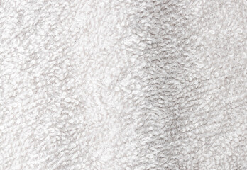 A white towel with a fuzzy texture