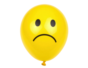 A yellow balloon features a sad face with two black oval eyes and a curved-down mouth, expressing unhappiness or disappointment.
