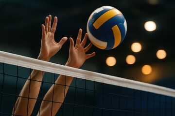 Two hands reach above net toward ball in indoor arena, showing teamwork, precision and competition