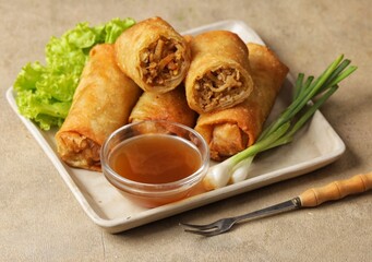 Lumpia rebung. Bamboo spring rolls are a snack in the form of an omelette filled with bamboo...