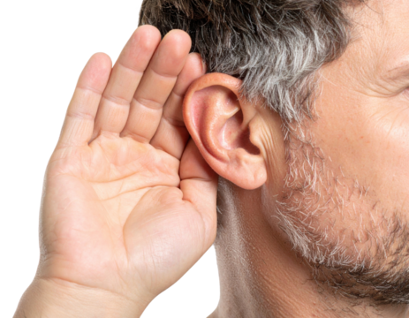 A close-up of a man cupping his hand behind his ear, signaling the act of listening intently.