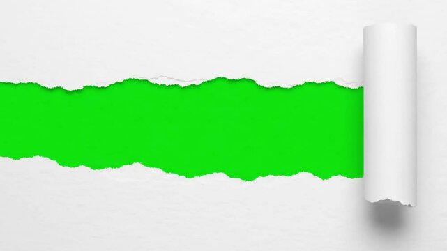 A sheet of white paper is torn open to reveal a vibrant green screen background