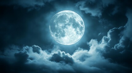 Full moon shining through dark clouds in night sky